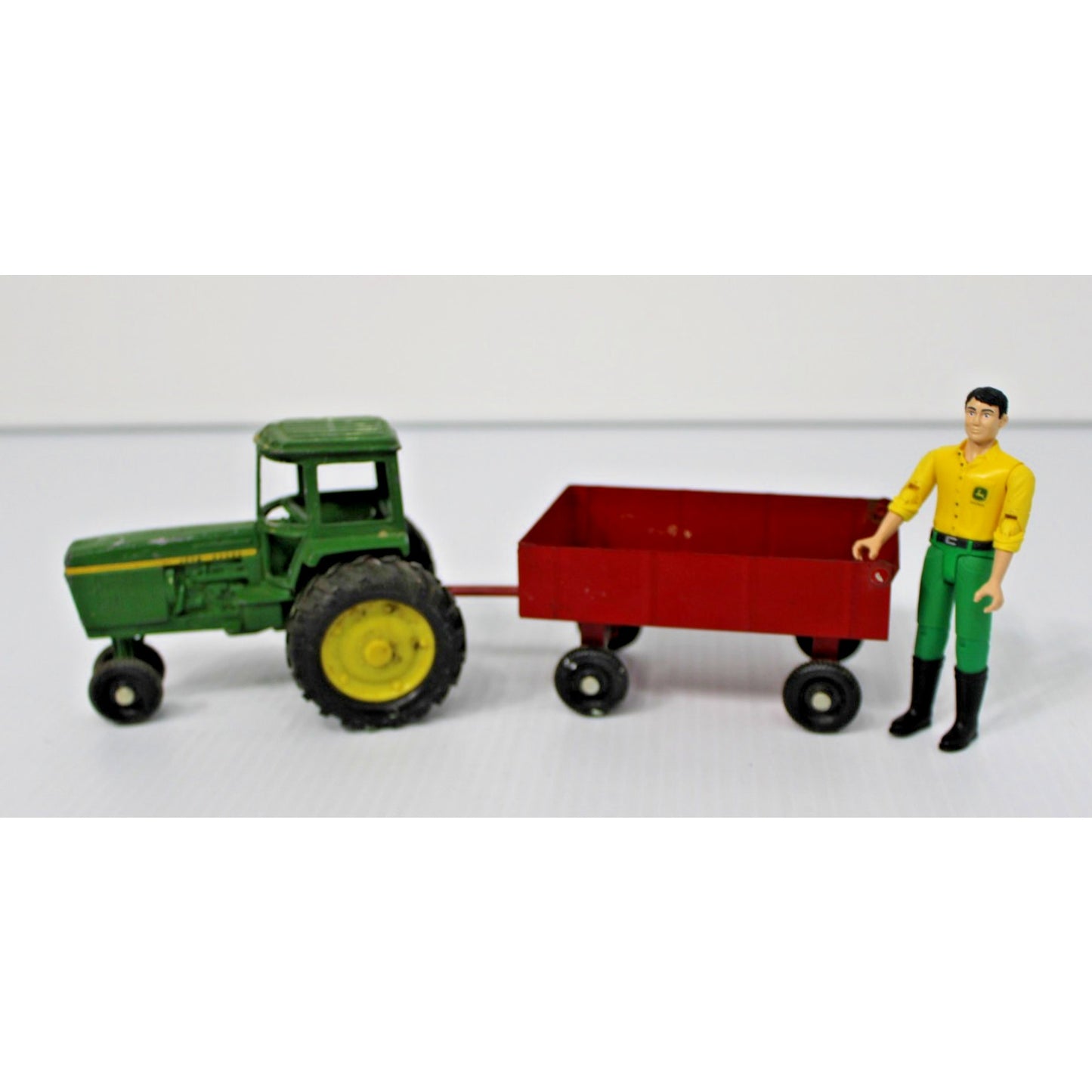 Vintage ERTL Co. Metal John Deere Tractor and Trailer Toy Set with Figure 1:16