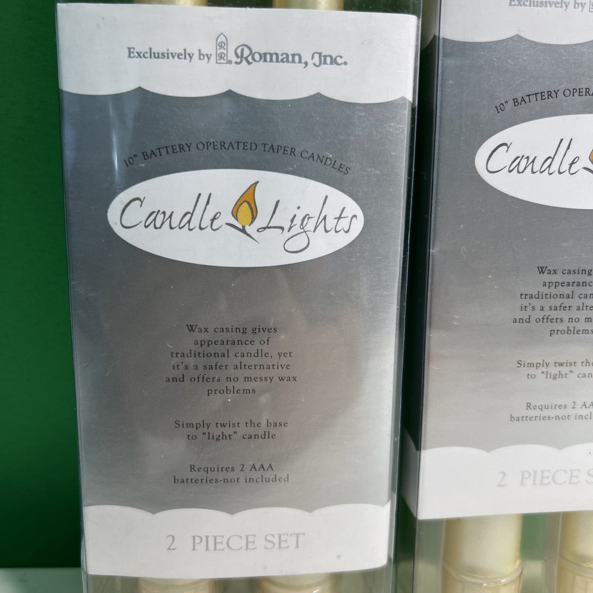 10” Battery Operated Taper Wax Candles x 4 by Roman, Inc. Requires AAA Batteries