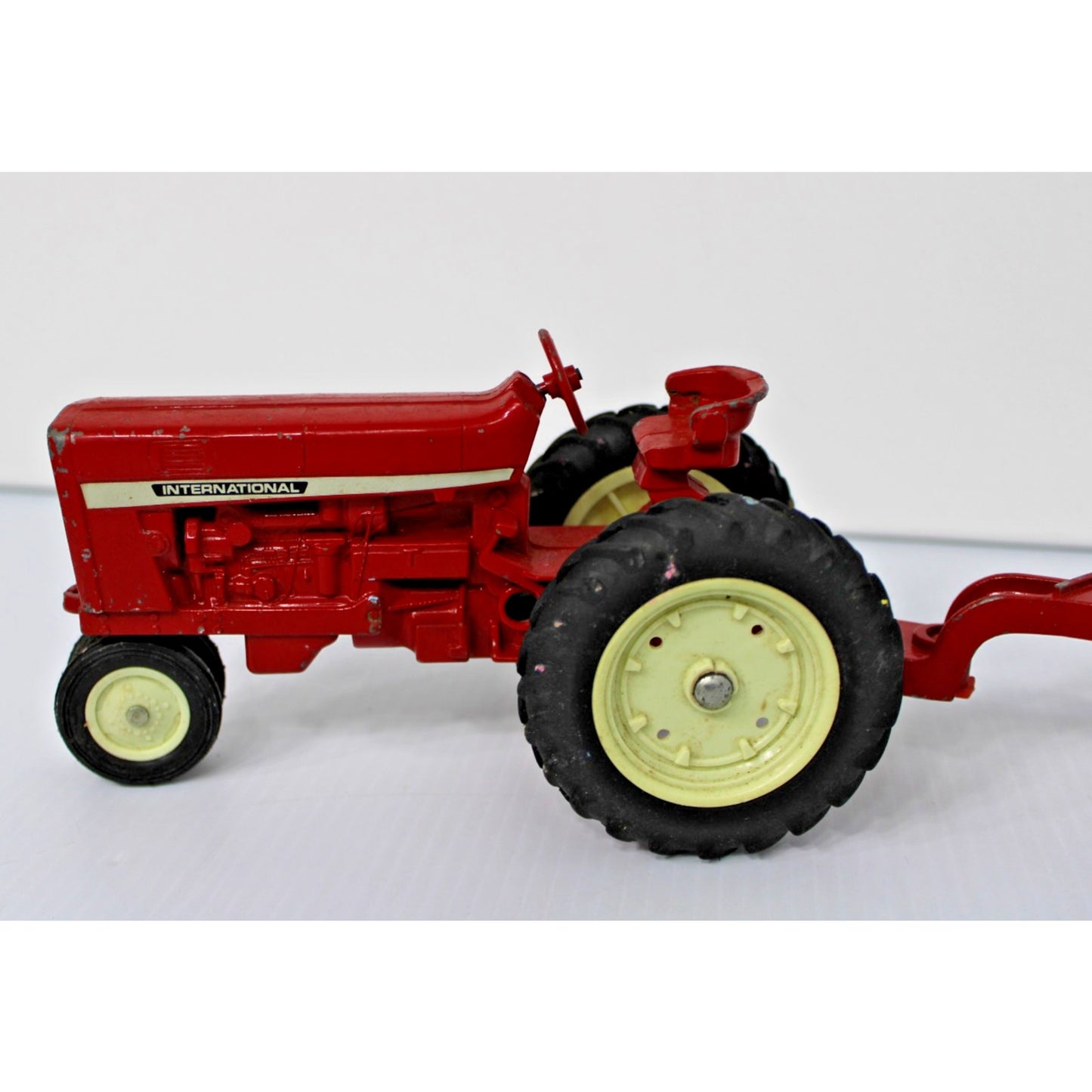 Vintage ERTL Co. 1:16 Scale Metal International Tractor, Wagon, 2 Plows Toy Set