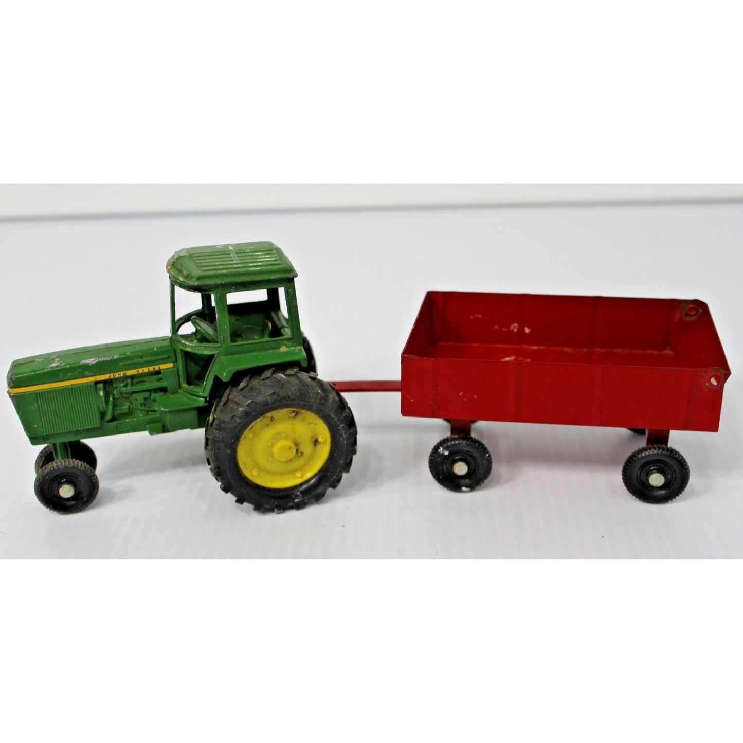 Vintage ERTL Co. Metal John Deere Tractor and Trailer Toy Set with Figure 1:16