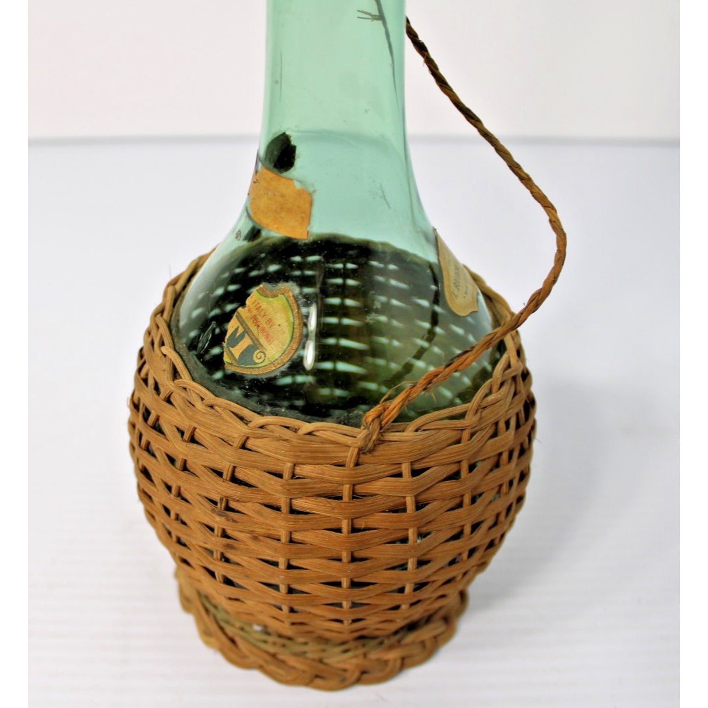 Vintage 21"H Green Glass Demijohn Carafe in Raffia, New Orleans Import Label