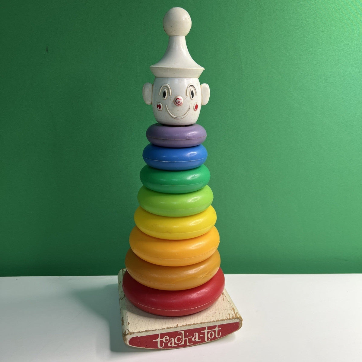 1960's a "Teach-A-Tot" Toy Wood Rocking Rainbow Stacking Plastic Donuts Clown