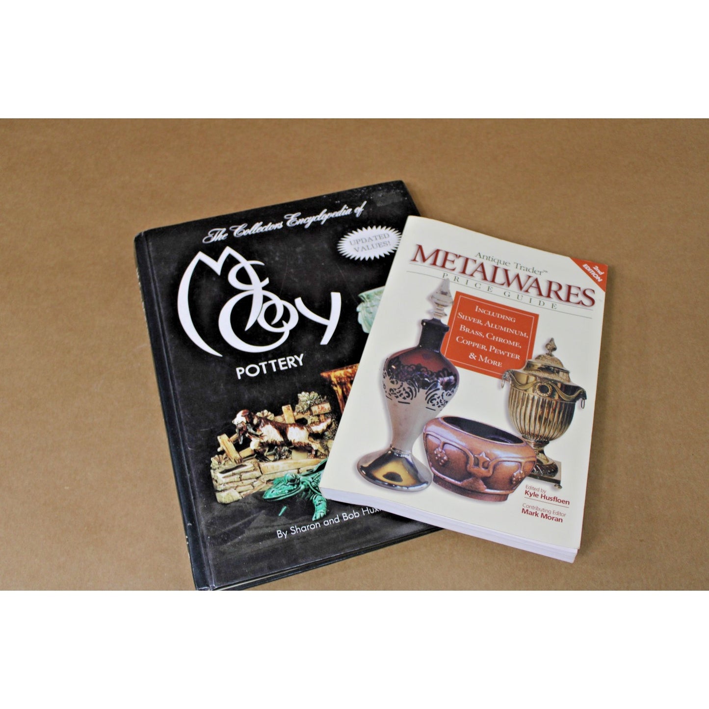 Two (2) Antiques Identification/ Pricing Guides, McCoy Pottery, Metalwares