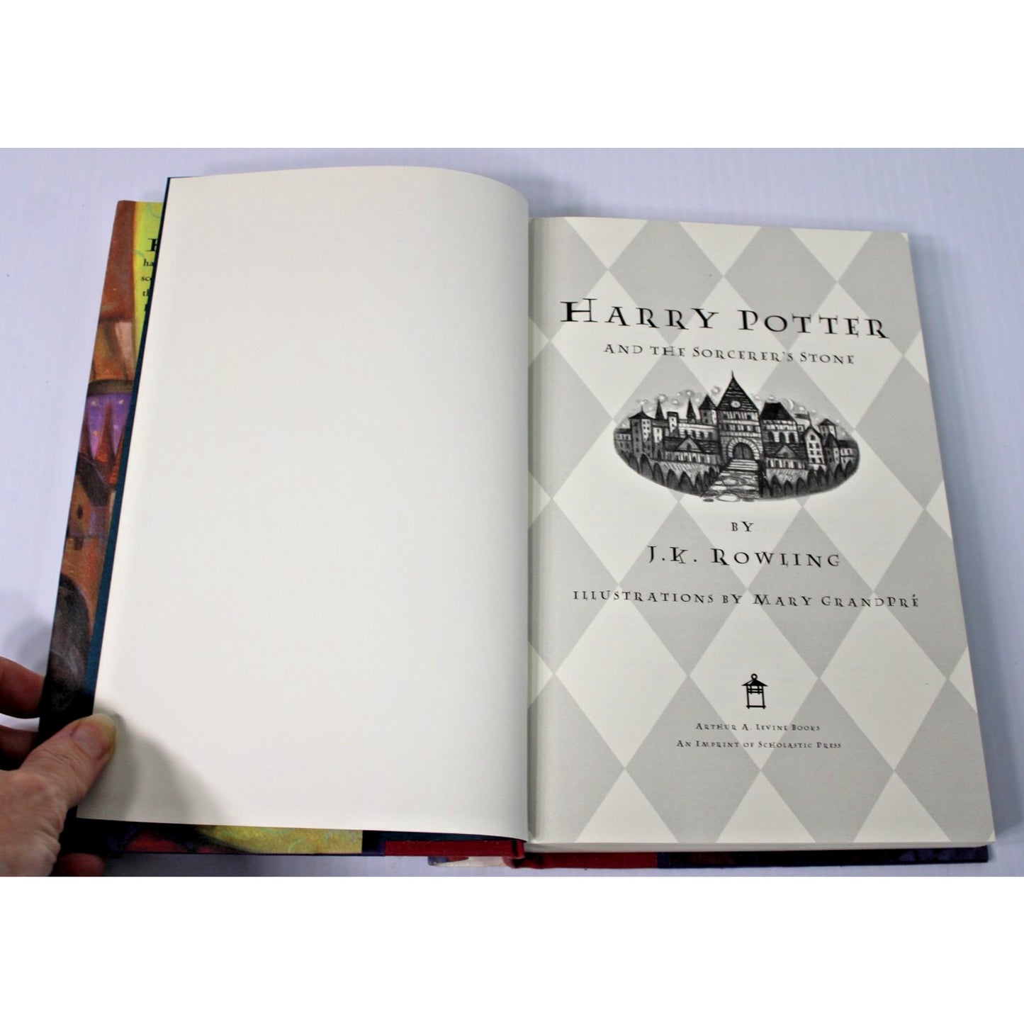 Harry Potter & The Sorcerer’s Stone– J.K. Rowling, 1998 1st American Edition HC