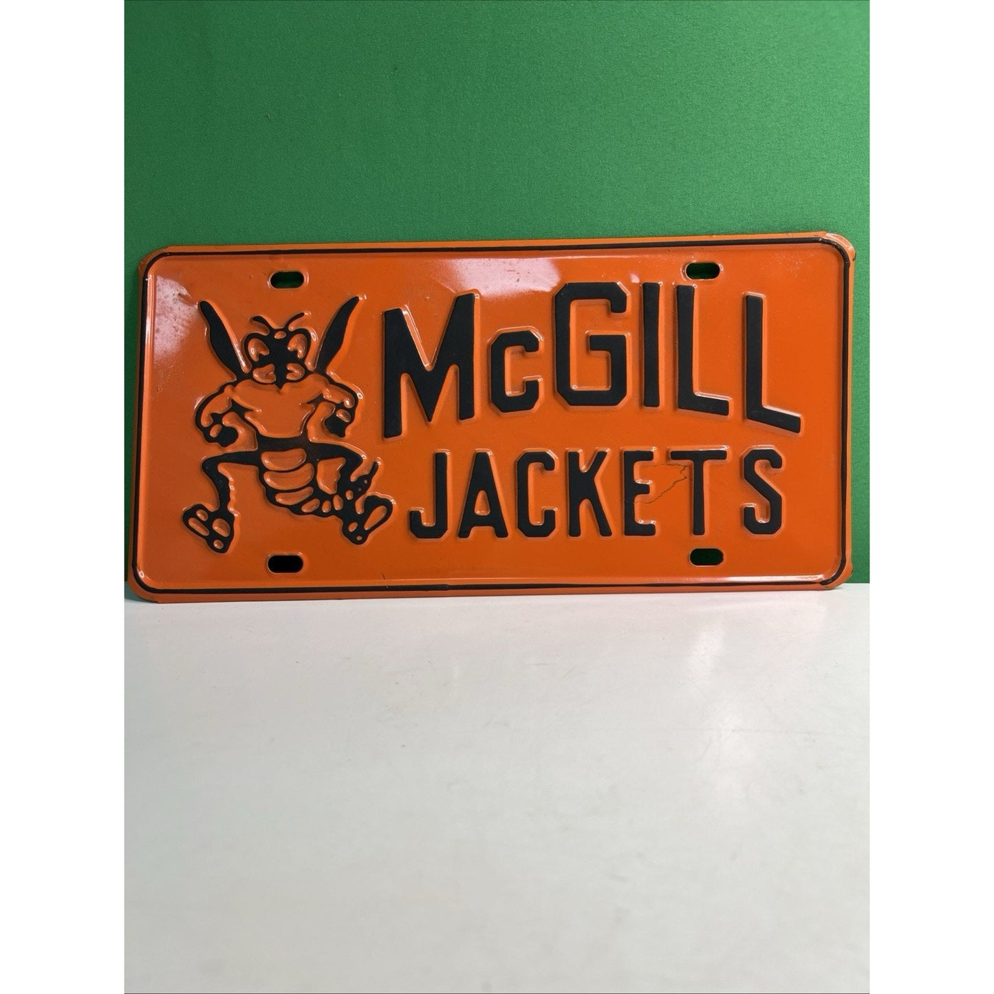 VINTAGE McGill Toolen High Jackets SCHOOL BOOSTER METAL LICENSE PLATE