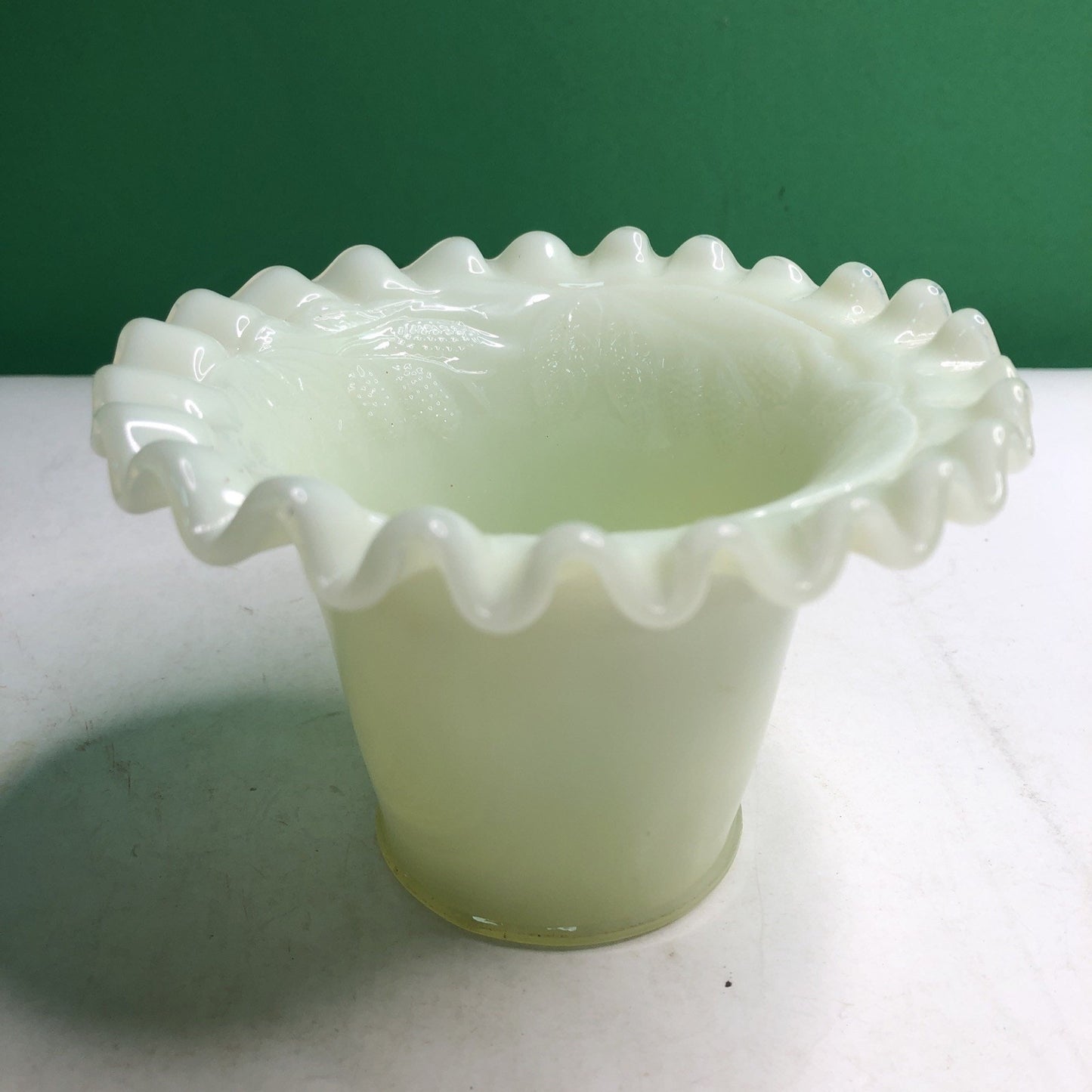Vintage Uranium Custard Glass Vase 3.5” Tall Ruffle Top Grape Leaf Design Glows