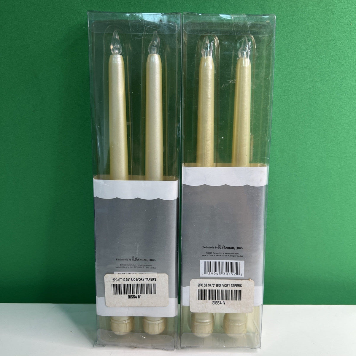 10” Battery Operated Taper Wax Candles x 4 by Roman, Inc. Requires AAA Batteries