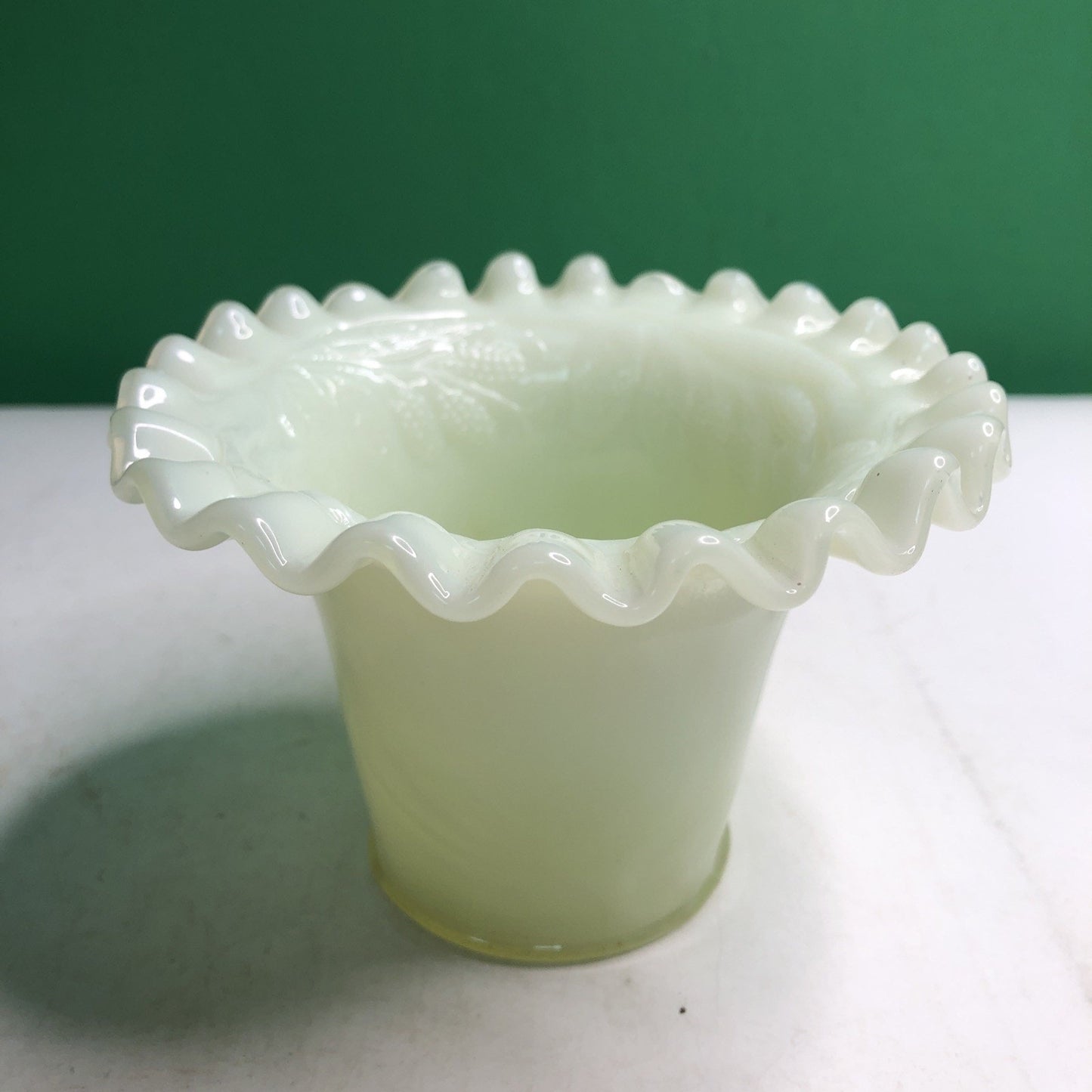 Vintage Uranium Custard Glass Vase 3.5” Tall Ruffle Top Grape Leaf Design Glows
