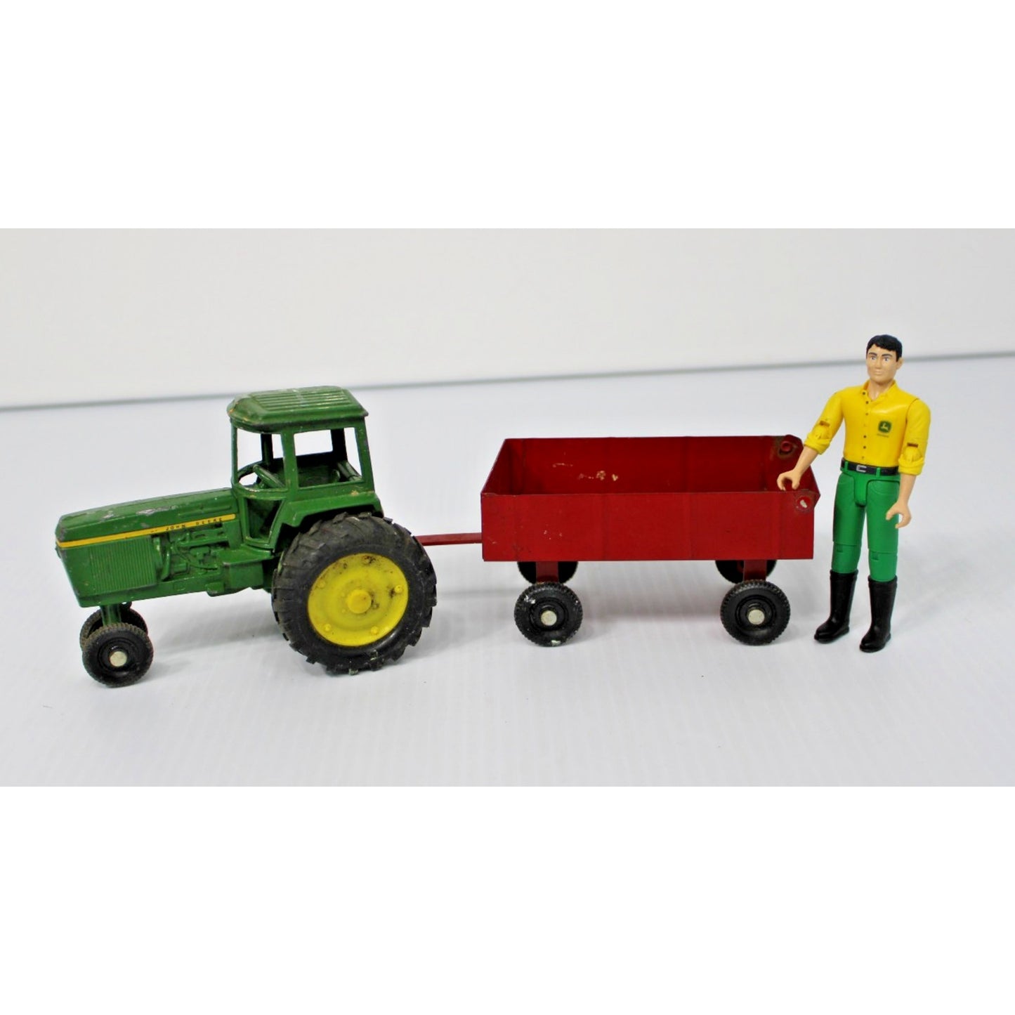 Vintage ERTL Co. Metal John Deere Tractor and Trailer Toy Set with Figure 1:16