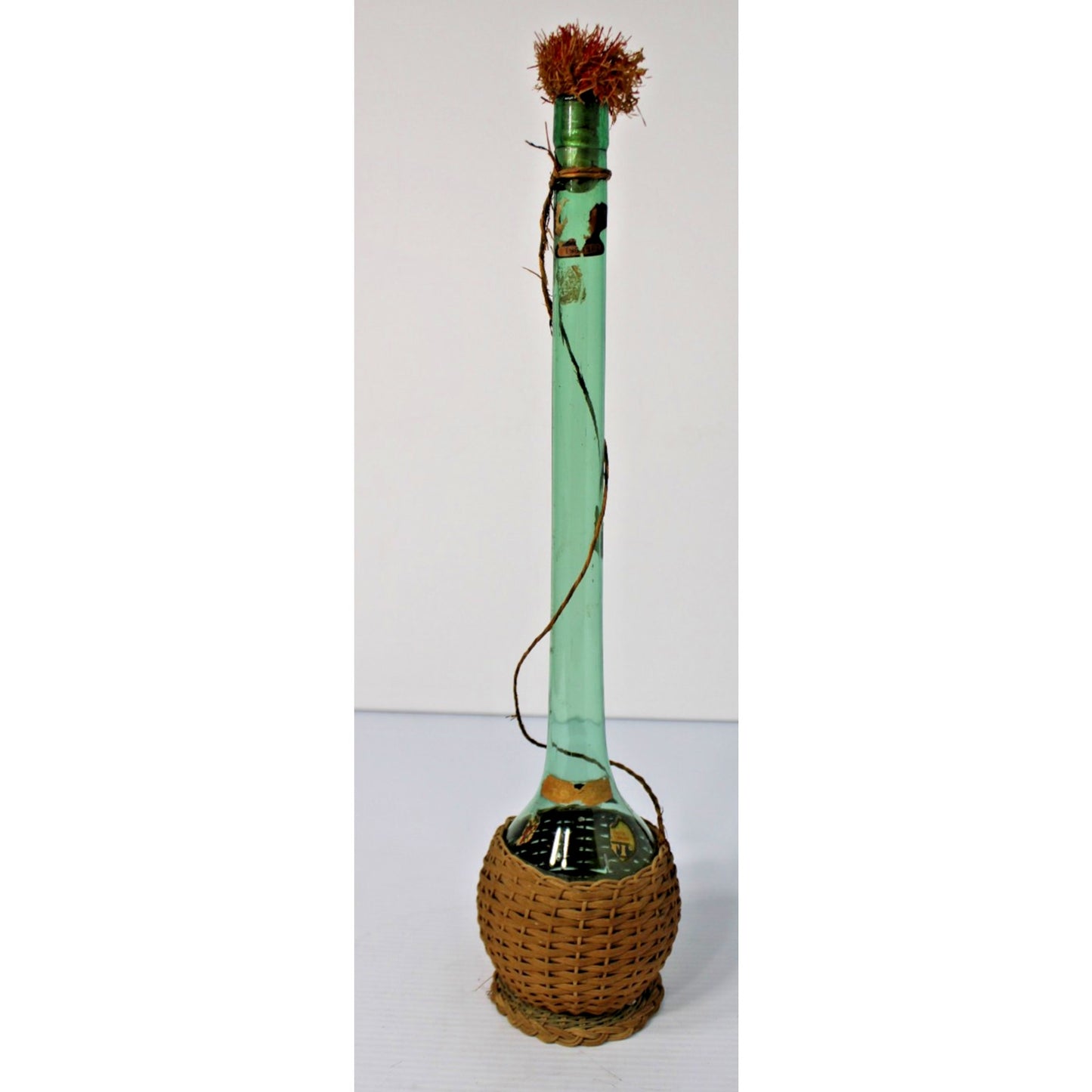 Vintage 21"H Green Glass Demijohn Carafe in Raffia, New Orleans Import Label