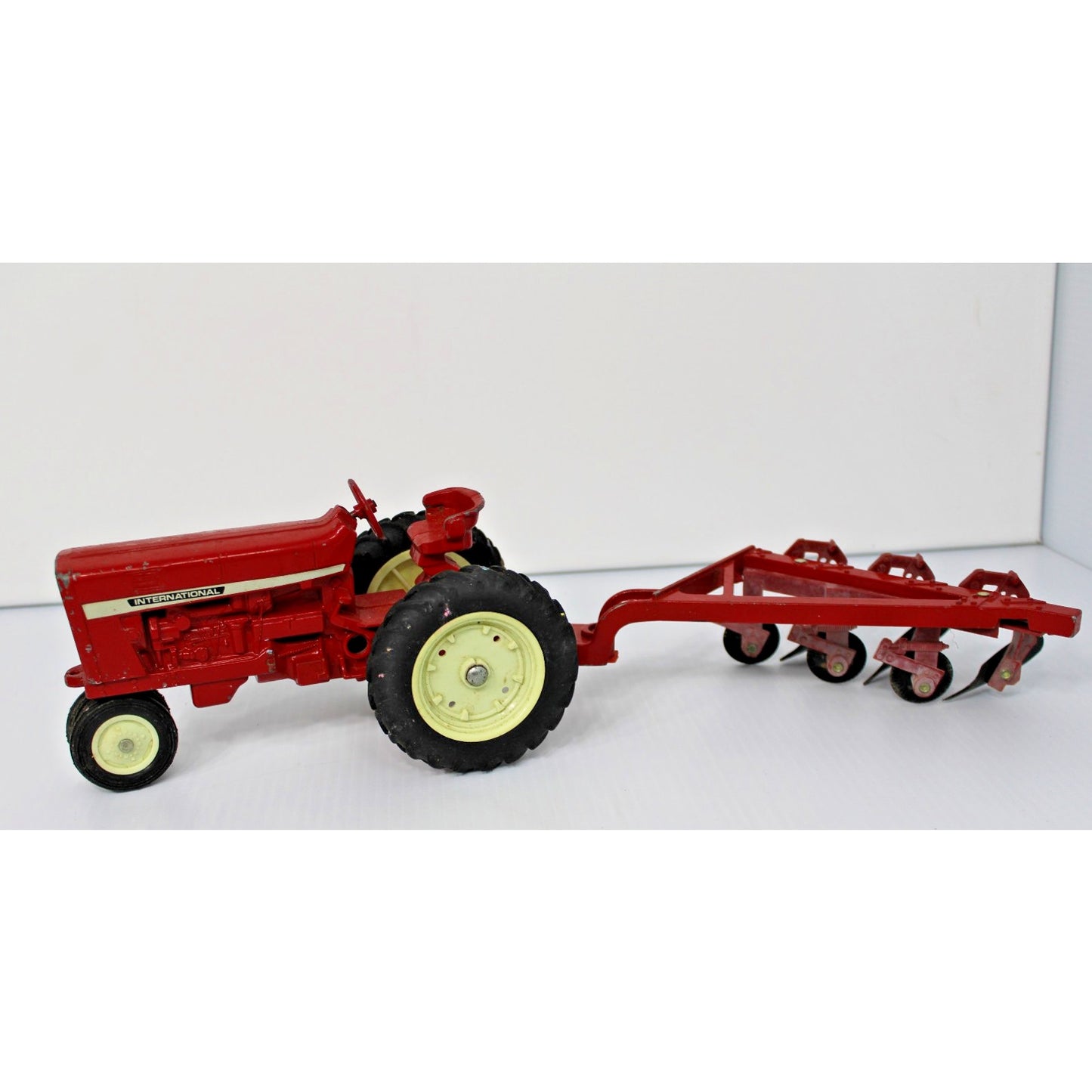 Vintage ERTL Co. 1:16 Scale Metal International Tractor, Wagon, 2 Plows Toy Set