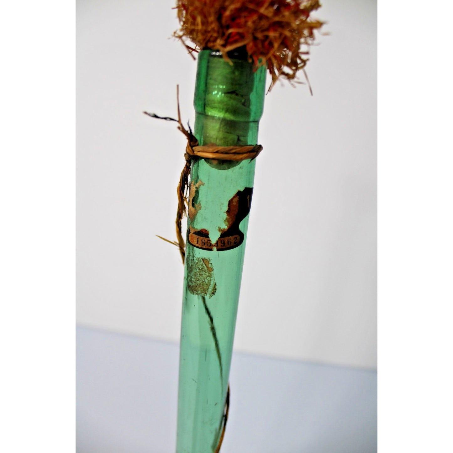 Vintage 21"H Green Glass Demijohn Carafe in Raffia, New Orleans Import Label