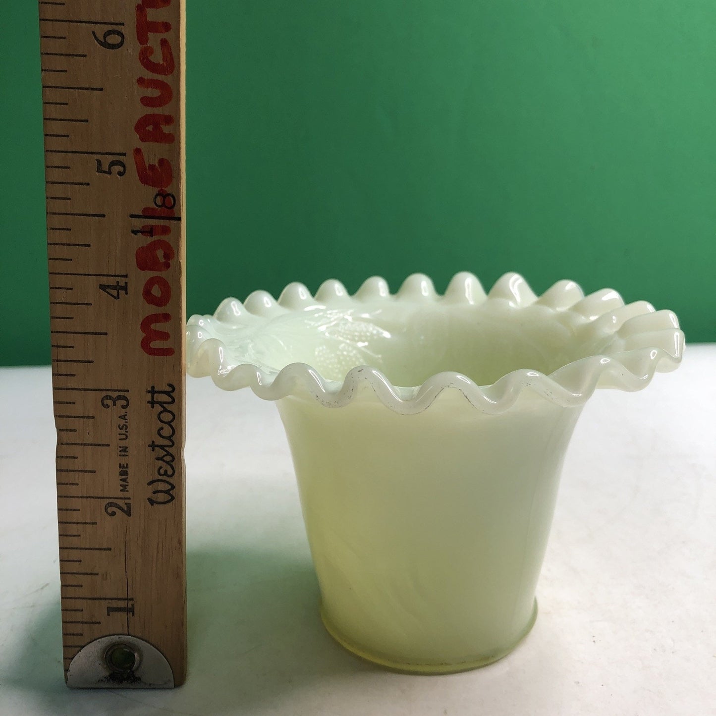 Vintage Uranium Custard Glass Vase 3.5” Tall Ruffle Top Grape Leaf Design Glows