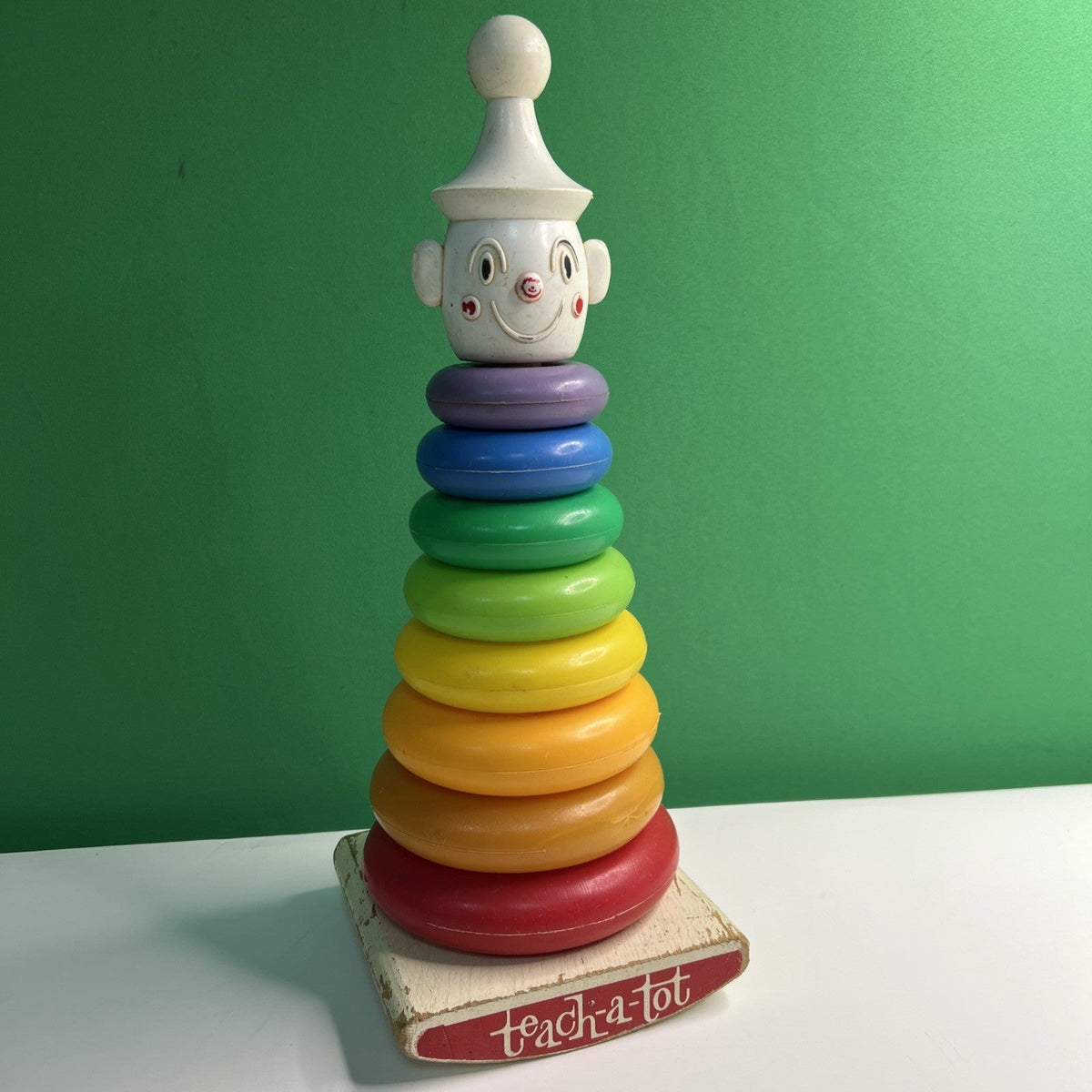 1960's a "Teach-A-Tot" Toy Wood Rocking Rainbow Stacking Plastic Donuts Clown